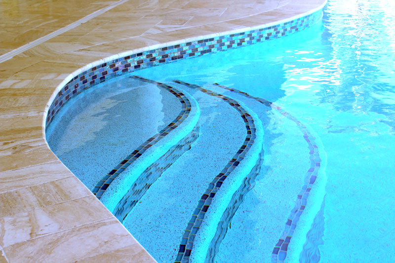 Curved Pool steps with decorative tile